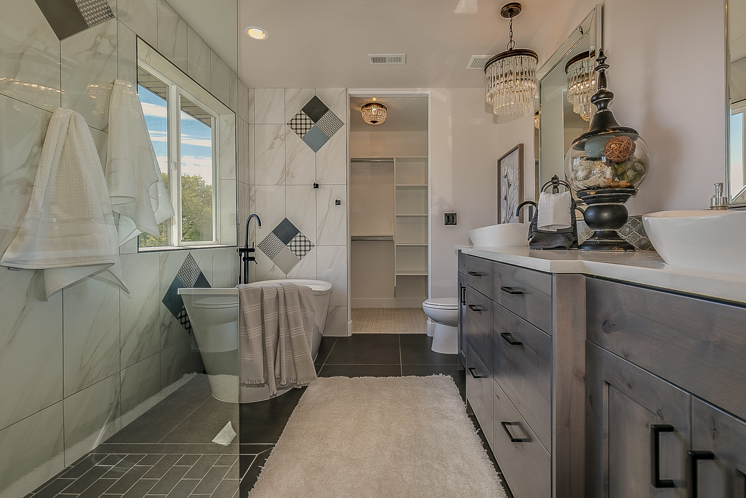 Double vessel sinks add trendy design to upscale bathroom